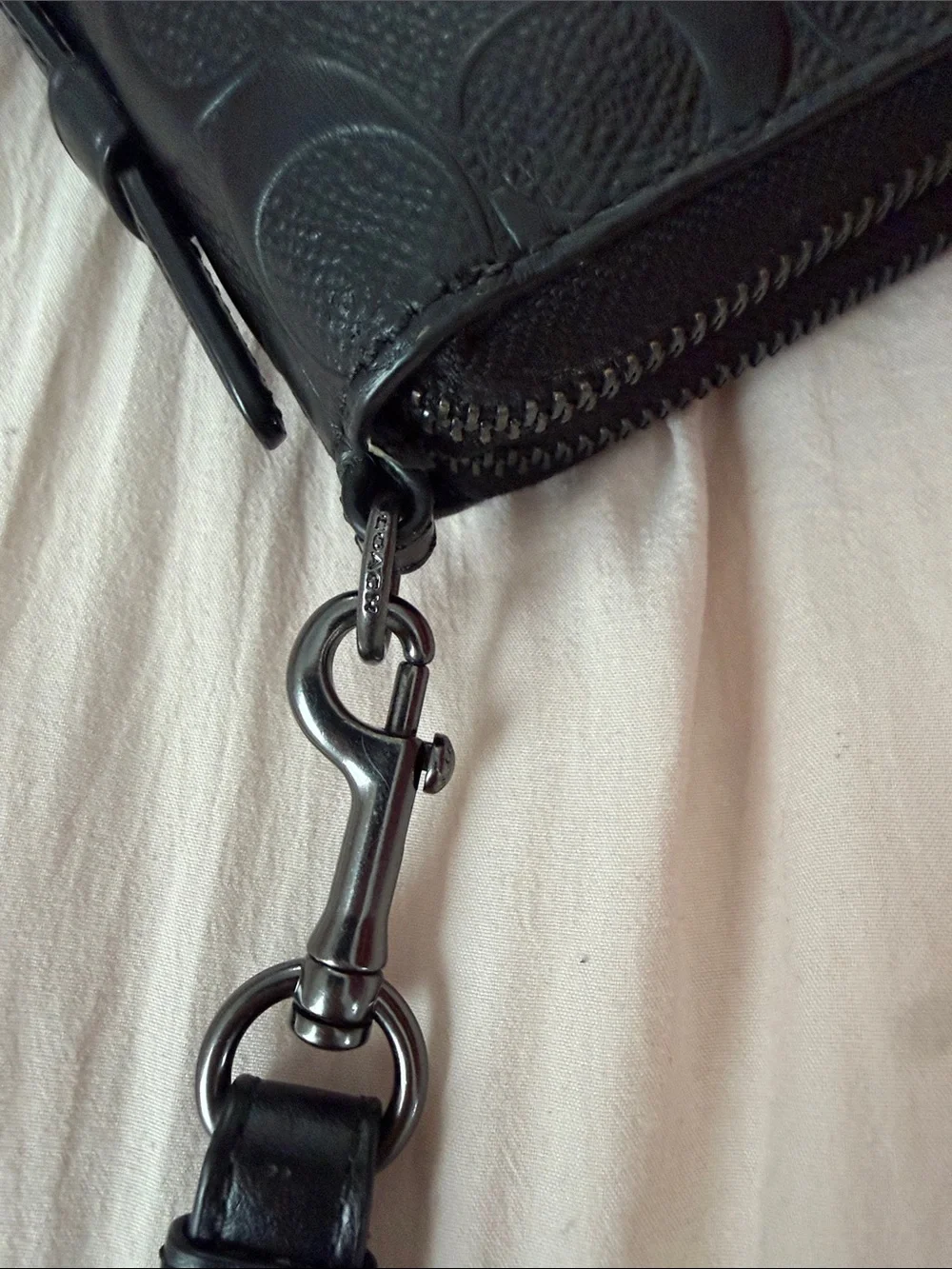 Coach Black Embossed Signature Wristlet men’s or women’s.